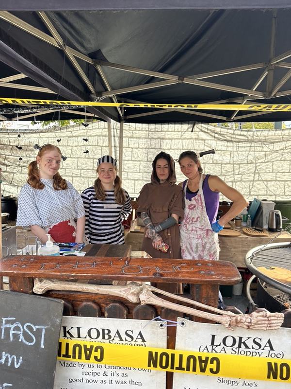 A street food team dressed up for Halloween
